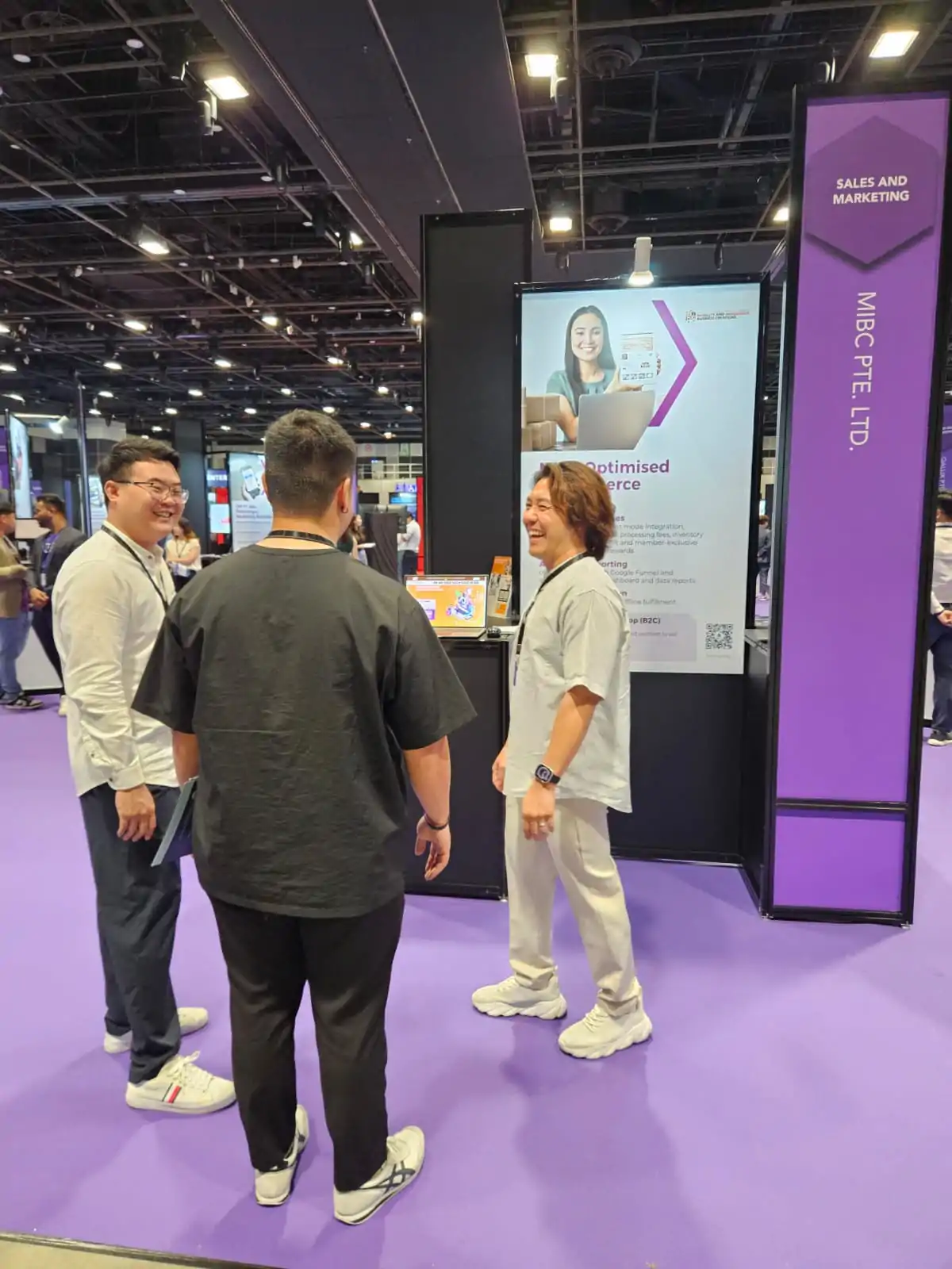 MIBC team members with visitors at the SMEs Go Digital Day 2025 booth