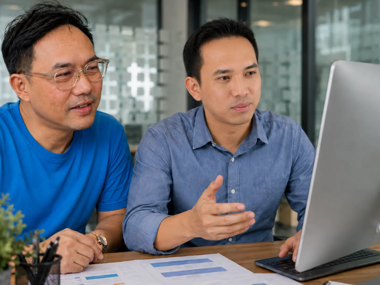Alpha Project and MIBC team reviewing the website revamp